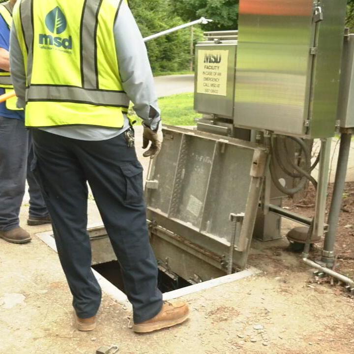 MSD workers near sewer well where MSD worker fell